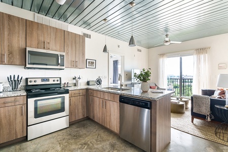 Prepare delicious meals in this modern kitchen with all the essentials.