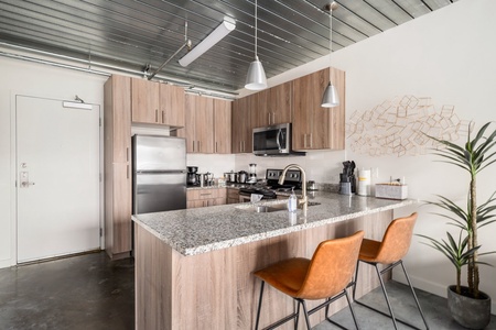 Create magic in this contemporary kitchen with all the necessary amenities.