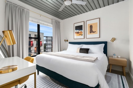 Rest in style on a memory foam bed in this cozy bedroom.