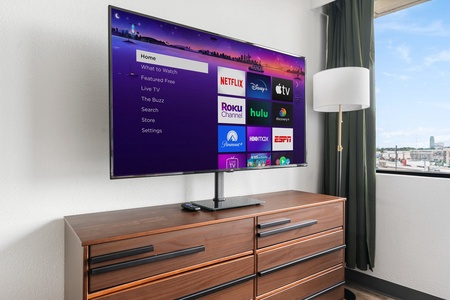 Stream your favorite shows on the smart TV with sound system.