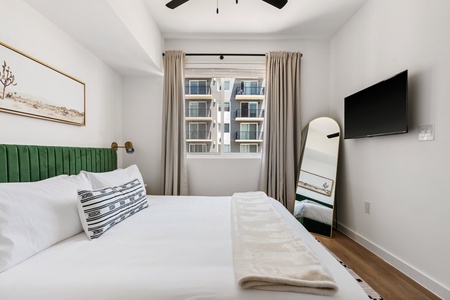 Bedroom 1: Experience ultimate relaxation. Our memory foam mattresses are paired with the privacy of an en-suite bathroom and the spaciousness of a walk-in closet.