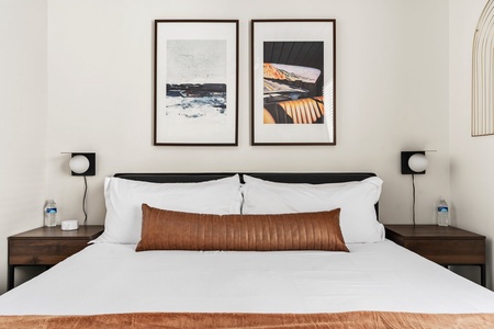 Get a great night’s sleep in our comfy king-size bed with a memory foam mattress, soft sheets, cozy pillows, blackout curtains, and a white noise machine