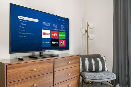 Binge-watch your preferred shows with the smart TV and sound system for streaming.