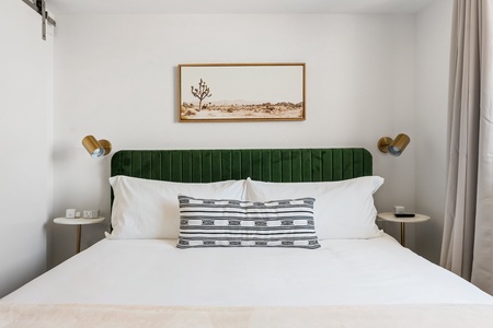 Find bliss on a memory foam bed in this comfortable bedroom.