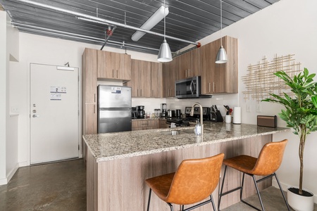 Create delicious meals in this well-equipped kitchen with modern amenities.