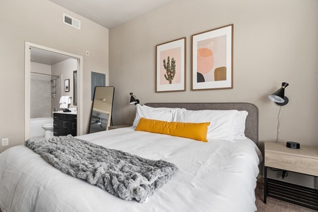 Get a restful night's sleep on a memory foam bed in this cozy bedroom.