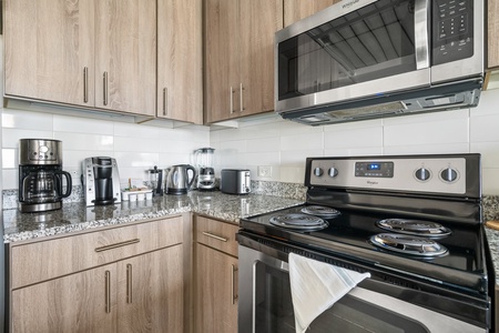 Prepare culinary masterpieces in this modern kitchen with all the essentials.