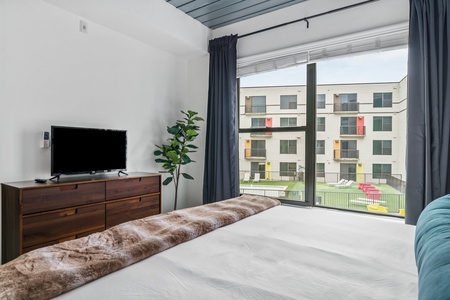 Sink into comfort on a memory foam bed in this inviting bedroom.