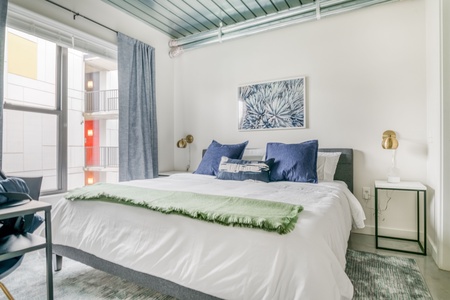 Sink into comfort on a memory foam bed in this inviting bedroom.