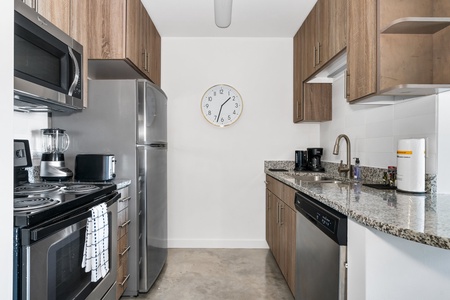 Cook up a storm in this contemporary kitchen with all the necessary amenities.