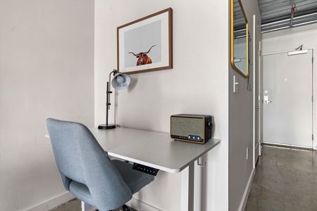This listing features both a dining table and an adjustable-height desk