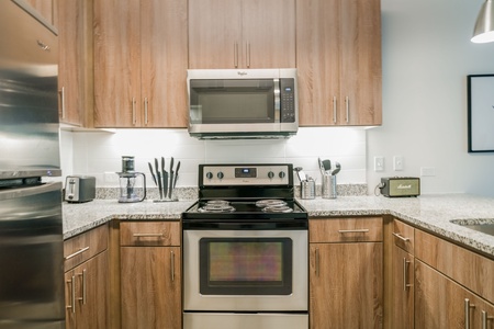 Prepare culinary masterpieces in this modern kitchen with all the essentials.