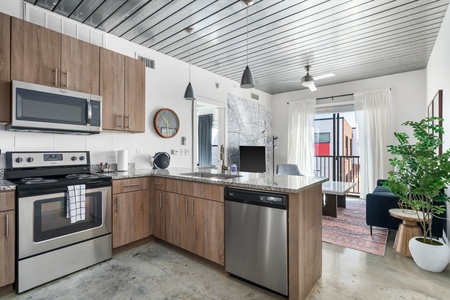 Craft tasty dishes in this contemporary kitchen with all the necessary amenities.