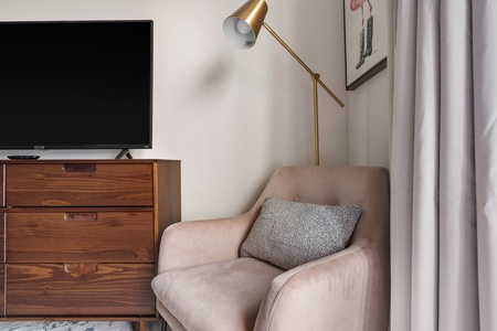 Cozy up in this inviting living space with a smart TV for entertainment.