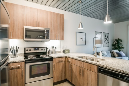 Craft tasty dishes in this contemporary kitchen with all the necessary amenities.