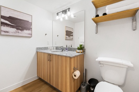 Indulge in complimentary toiletries by Malin + Goetz in the bathroom.
