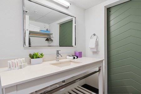 Freshen up in the modern bathroom with complimentary toiletries.