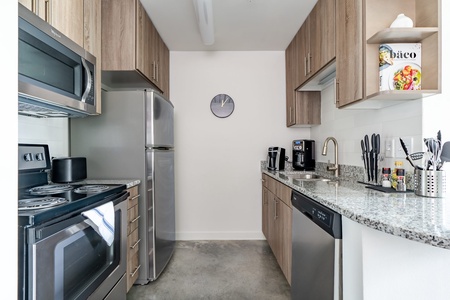 Prepare culinary masterpieces in this modern kitchen with all the essentials.