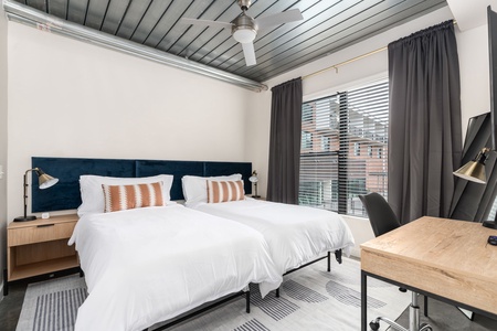 Optional Extra: One bedroom can be set up with two twin XL beds instead of a king for a nighly supplement on extended stays - please contact us for details (this is a photo from another apartment - the apartment has art above the beds))