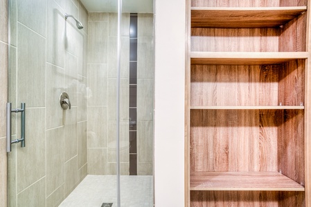 Renew in the updated walk-in shower with modern fixtures.