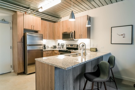 Cook up a storm in this contemporary kitchen with all the necessary amenities.