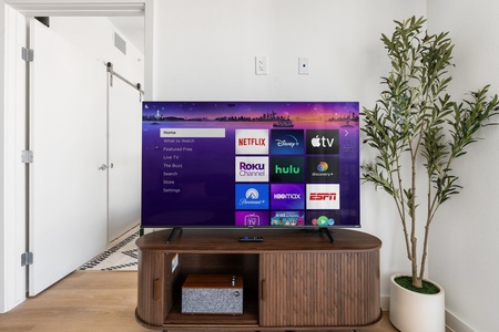 Immerse yourself completely in streaming your favorite shows with the Roku smart TV and sound system.