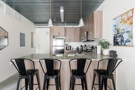 Prepare delicious meals in this modern kitchen with all the essentials.