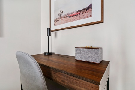 Make progress in the dedicated desk area with plenty of natural light.