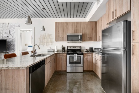 Prepare delicious meals in this modern kitchen with all the essentials.
