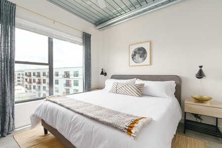 Sink into comfort on a memory foam bed in this inviting bedroom.