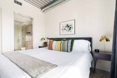 Sink into comfort on a memory foam bed in this inviting bedroom.