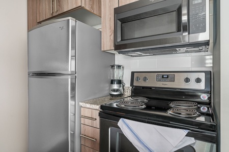 Enjoy cooking in this contemporary kitchen with all the essentials.