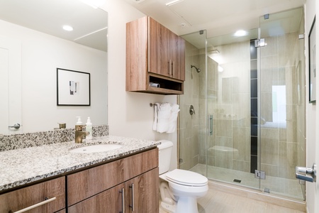 Experience luxury in the modern bathroom with complimentary toiletries.