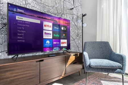 Dive into your preferred shows with the smart TV and sound system for streaming.