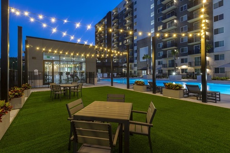The community features a pool with communal grills and a kids' play area