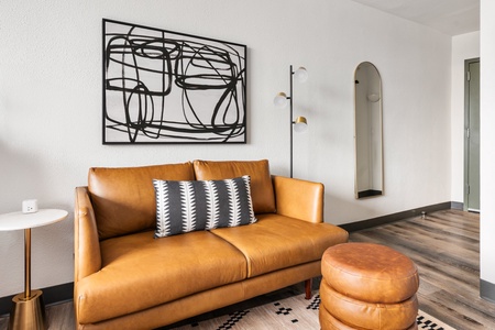 Enjoy downtime on a modern and cozy couch.