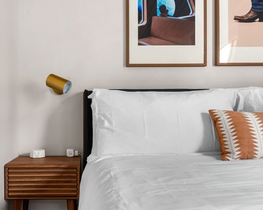 Get a restful night's sleep on a memory foam bed in this cozy bedroom.