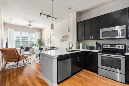 Whip up tasty treats in this modern kitchen with all the essentials.