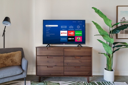 Binge-watch your preferred shows with the smart TV and sound system for streaming.