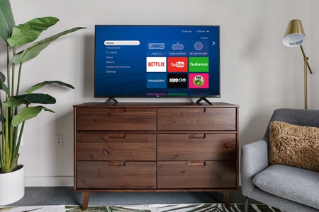 Binge-watch your preferred shows with the smart TV and sound system for streaming.