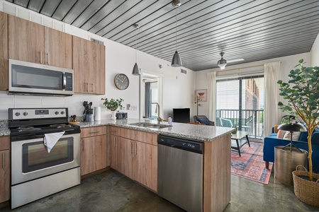 Prepare delicious meals in this modern kitchen with all the essentials.