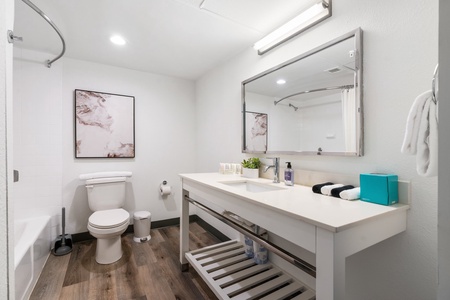 Freshen up in the modern bathroom with complimentary toiletries.