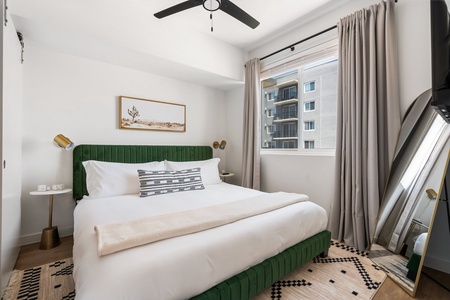 Get a restful night's sleep on a memory foam bed in this cozy bedroom.