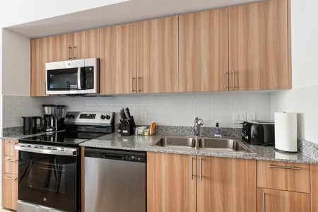 Prepare delicious meals in this modern kitchen with all the essentials.
