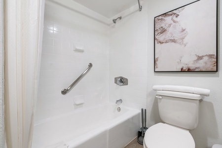 Enjoy a relaxing tub shower with complimentary essentials, including a hairdryer and blow dryer.