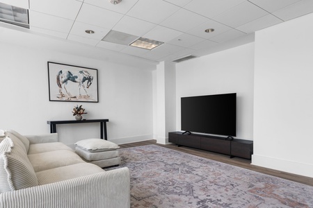 The residents' lounge provides a space to relax and connect, with a pool table and TV