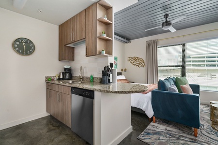 Prepare delicious meals in this modern kitchen with all the essentials.