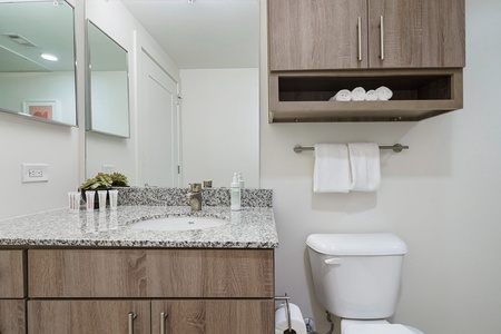 Rejuvenate in the sleek bathroom with complimentary toiletries.