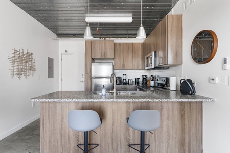 Enjoy cooking in this contemporary kitchen with all the essentials.