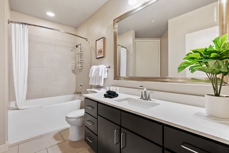 Get ready for the day in the sleek bathroom with complimentary toiletries.